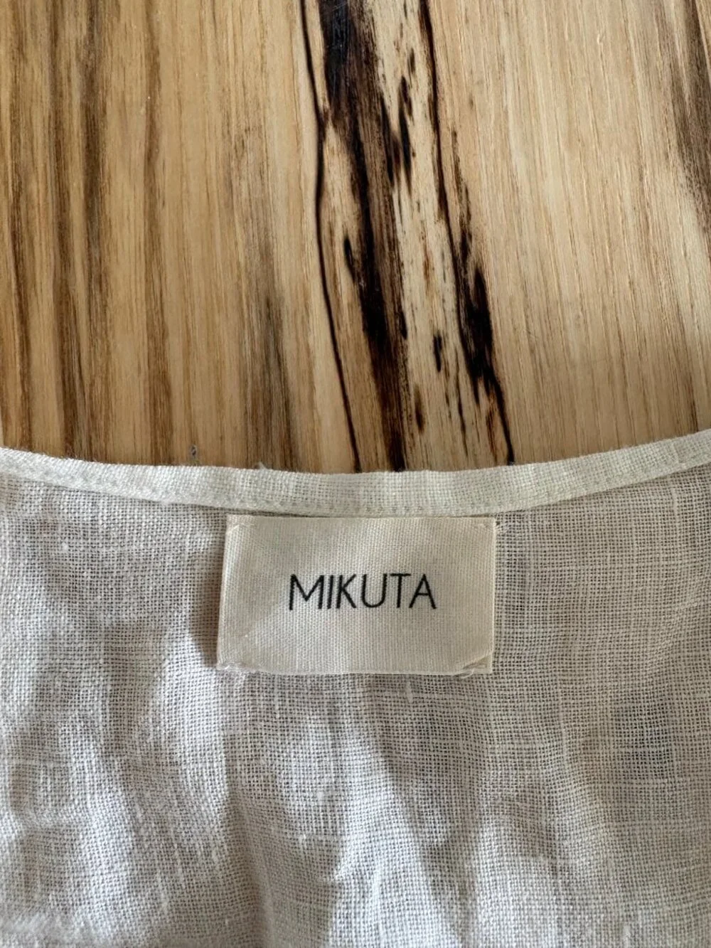 Mikuta white shortsleeve linen wrap shirt Women's small